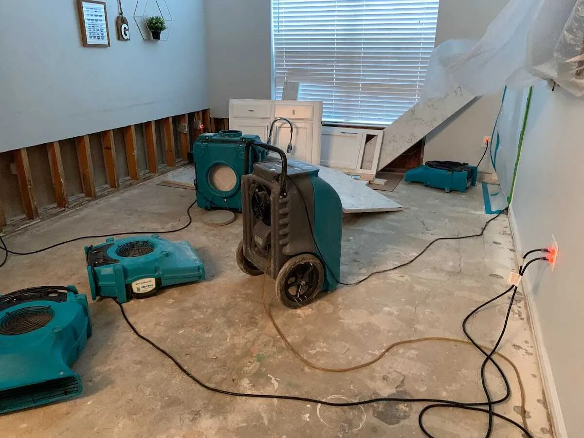 Dehumidifier in flood-cut room for Water Damage Restoration in Spring Lake Park